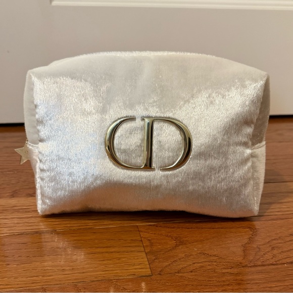 Dior Handbags - Dior Shimmering Cream Pouch with Gold Logo